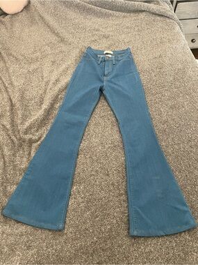 Vibrant blue High-Rise Flare Jeans. NWOT size 2/23